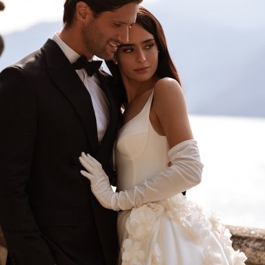 New arrival designer wedding dress with lace details and a sculpted bridal silhouette.
